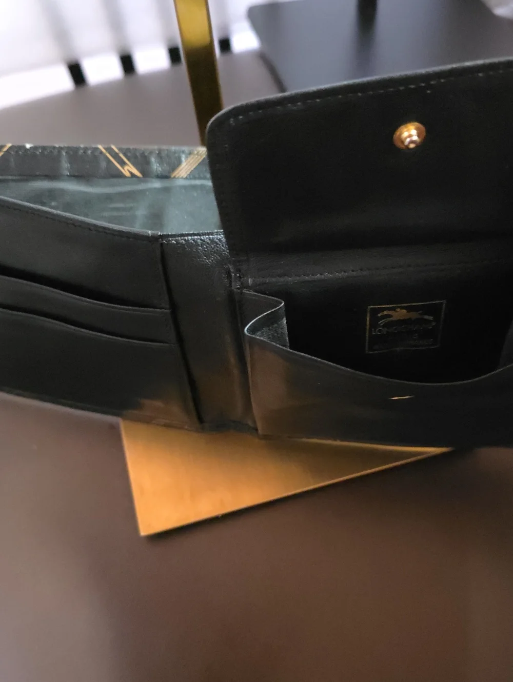 Longchamp Black and Gold Printed Leather Wallet